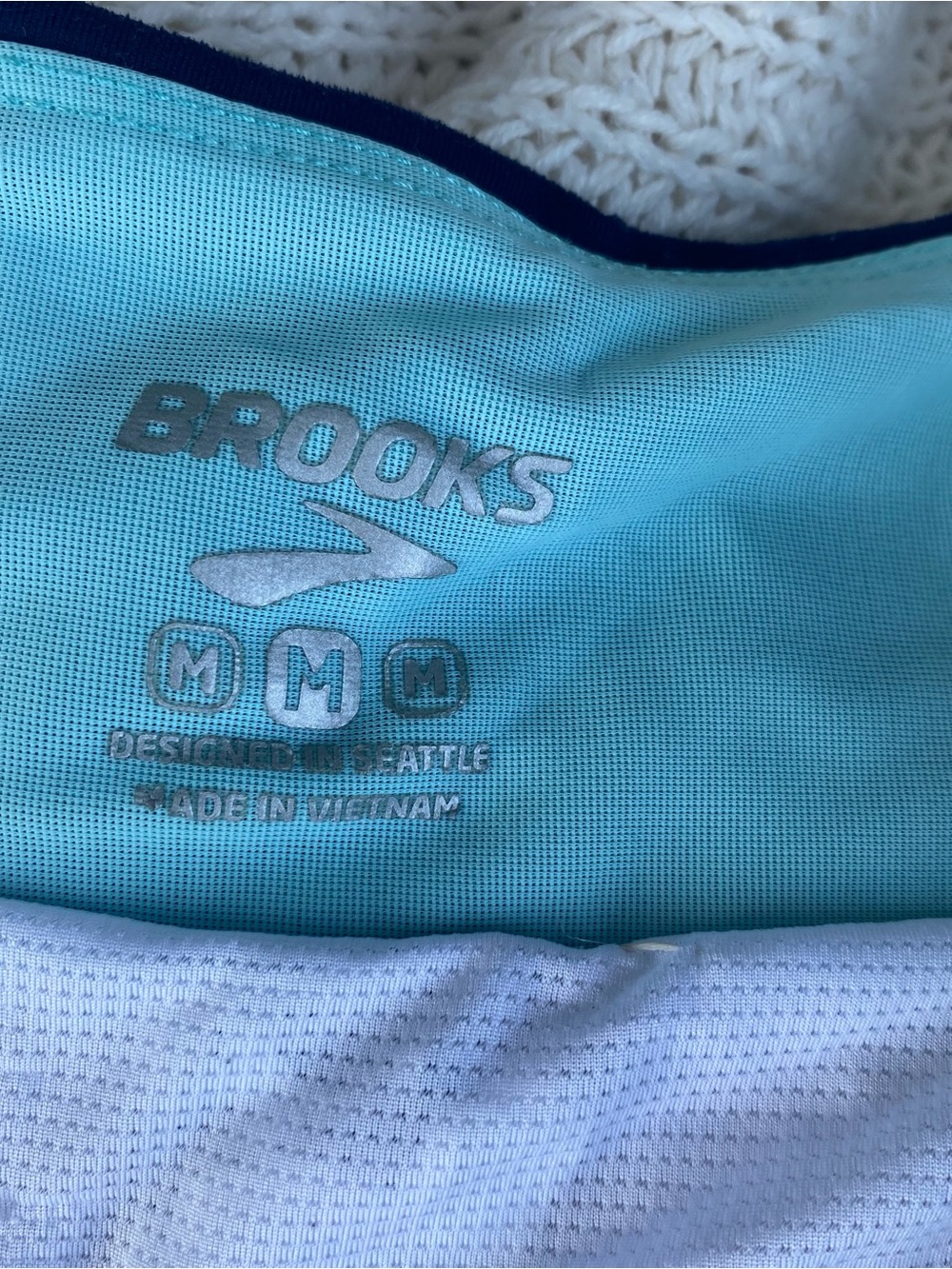 Brooks White Athletic Shorts with Navy Waistband and Multicolor Stripe - Picture 3 of 3